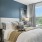 Bedroom with natural lighting and high ceilings