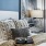 a bed and a lamp near a window
