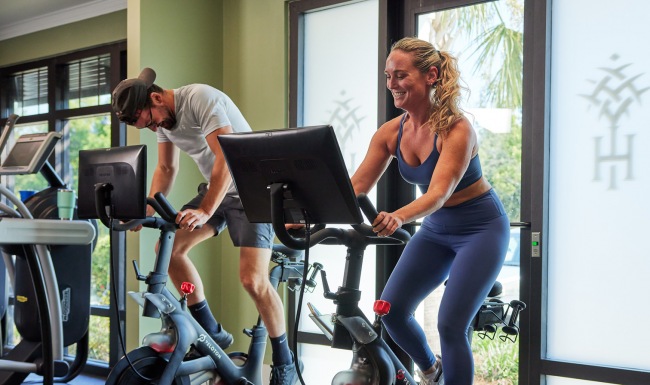 People working out on cardio equipment